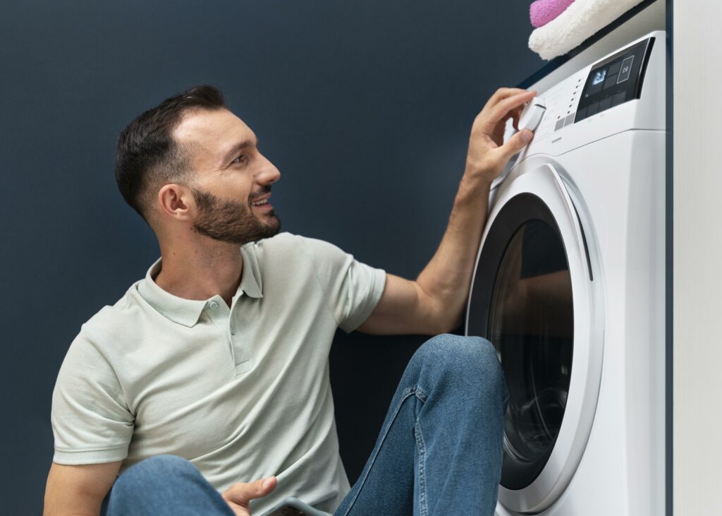 Man Waiting Washing Machine Finish Its Program 1024x731